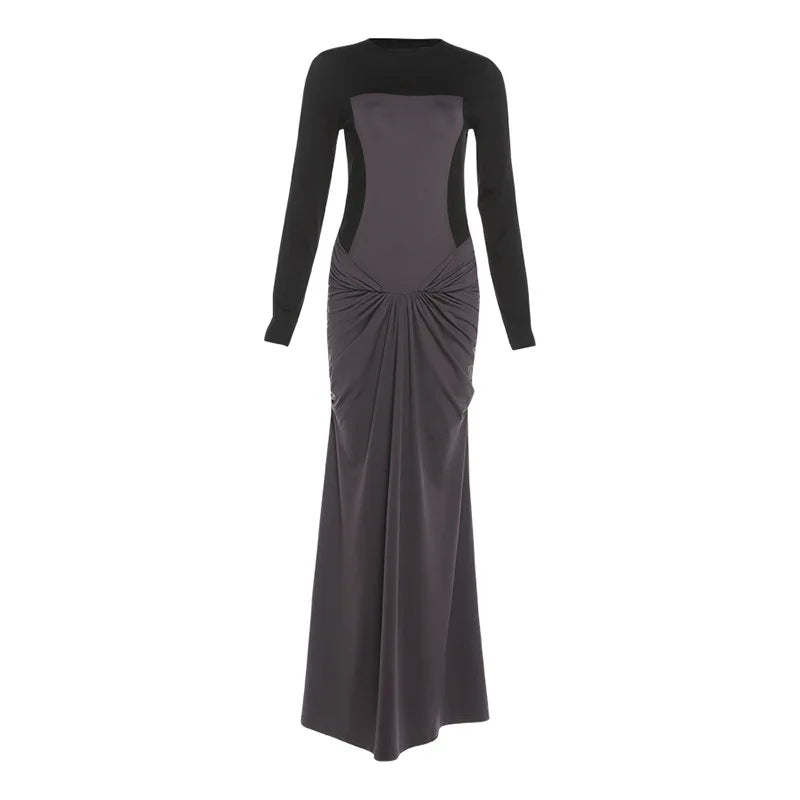 Slim sheath wrap design dress displayed in a modern purple-lit scene.