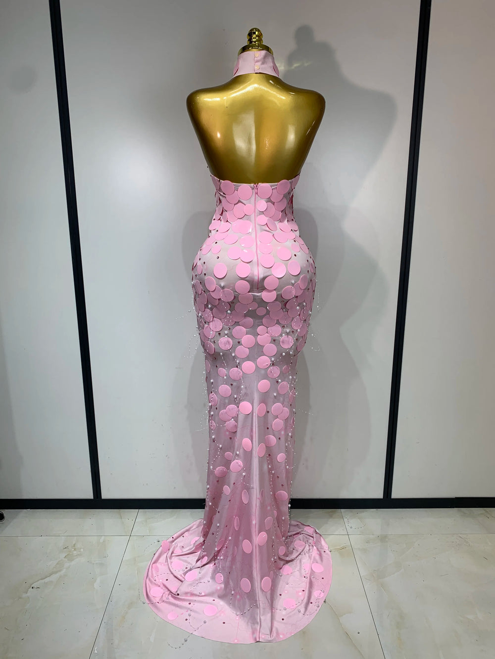 Strapless sequined form-fitting floor-length gown