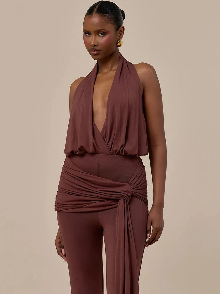 Model showcasing a brown draped halter top and matching wide leg pants set.