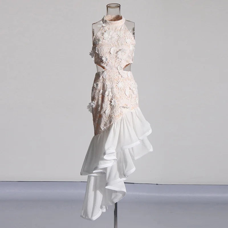 White floral dress on a mannequin against a plain background