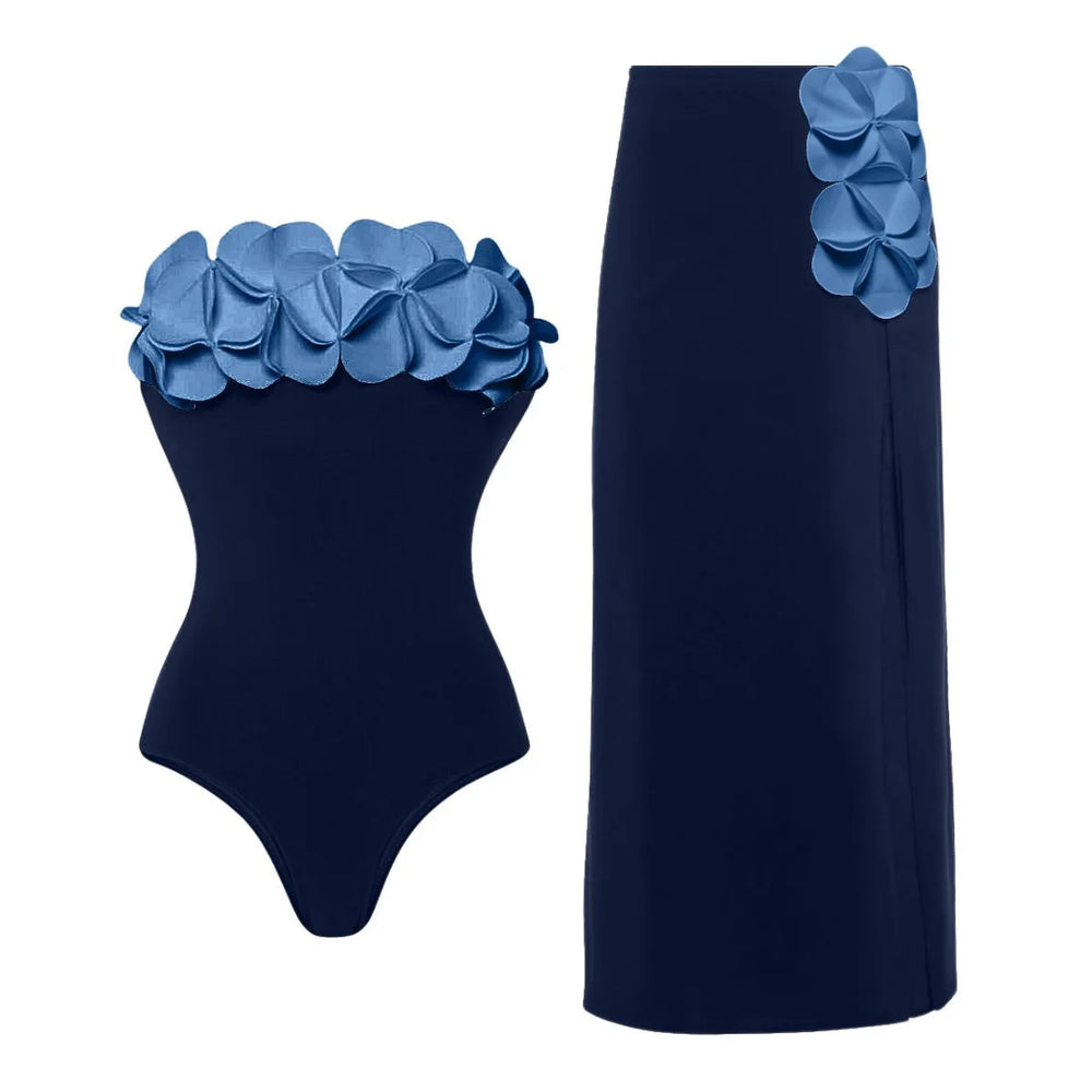 Strapless swimsuit with blue floral appliqués and matching high-waist maxi skirt