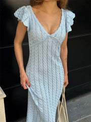 Light blue ruffled knit maxi dress with a V-neck.