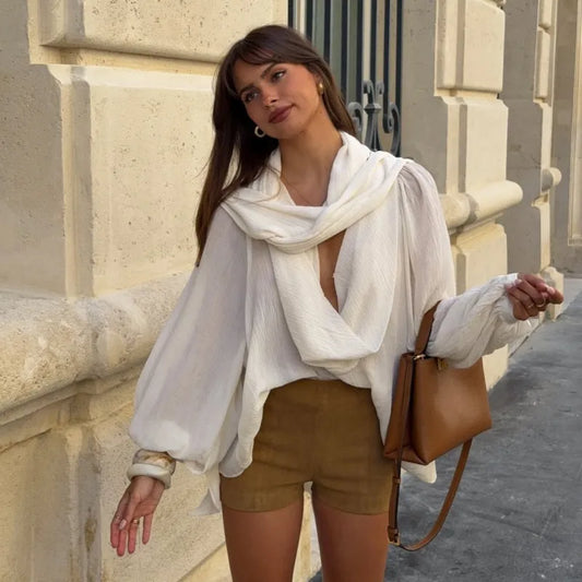 Draped V-neck long sleeve top styled with shorts