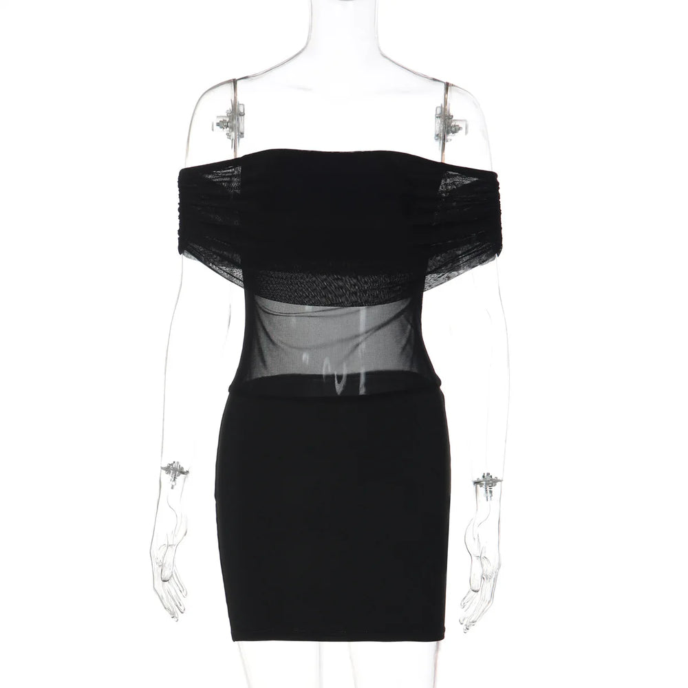 Black off-shoulder dress with sheer overlay on a mannequin against a white background