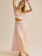 Patchwork lace trimmed crop top and maxi skirt set studio shot