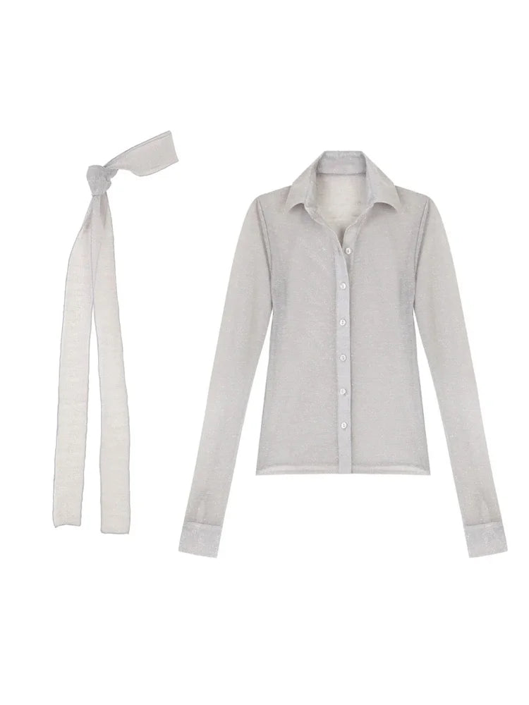 Light gray shirt with a white bow on a white background