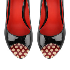 Top view of patent peep toe platform heels with polka dot toe detail