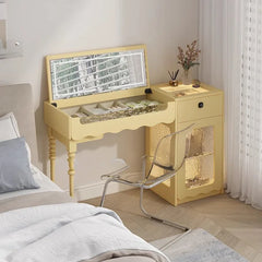 Yellow vanity table with mirror and chair in a bedroom setting