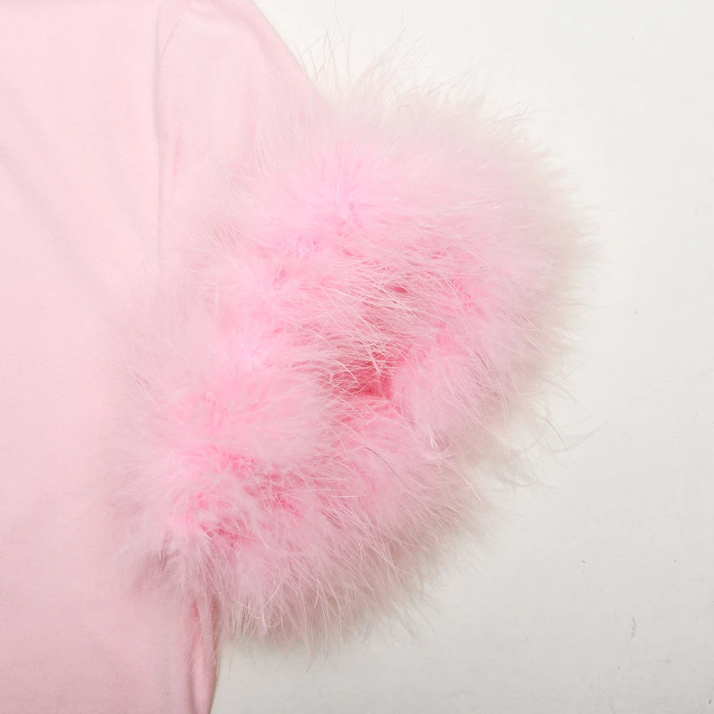 Close-up of pink fur on a light pink background