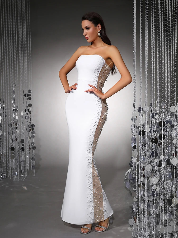 Strapless pearl embellished bodycon maxi dress with hands on hips