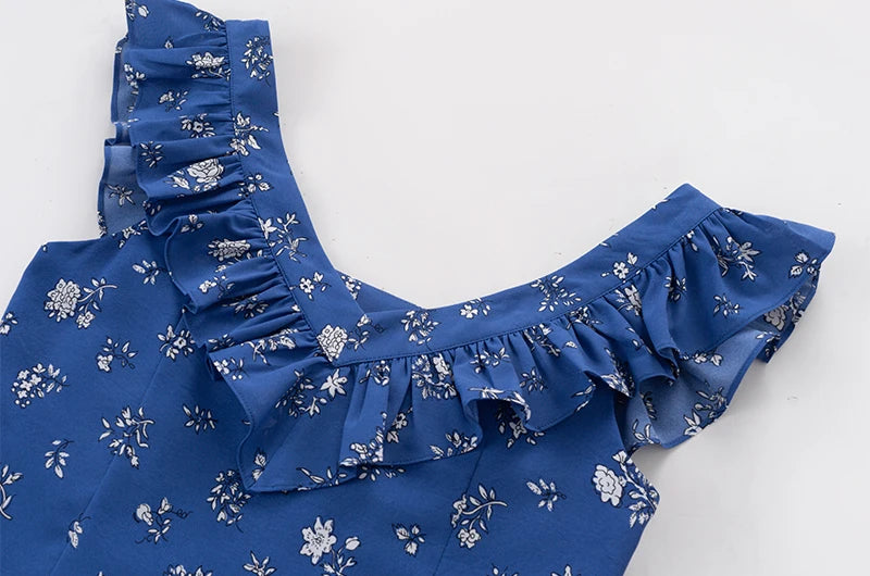 Close-up of ruffled V-neck on a sleeveless A-line mini dress