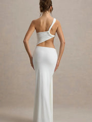 Woman wearing a white one-shoulder dress with a plain background
