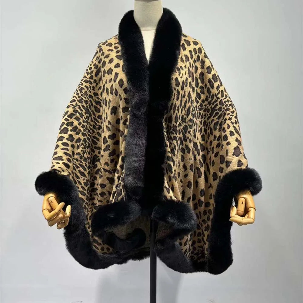 Leopard print coat with black fur trim on a mannequin against a gray background