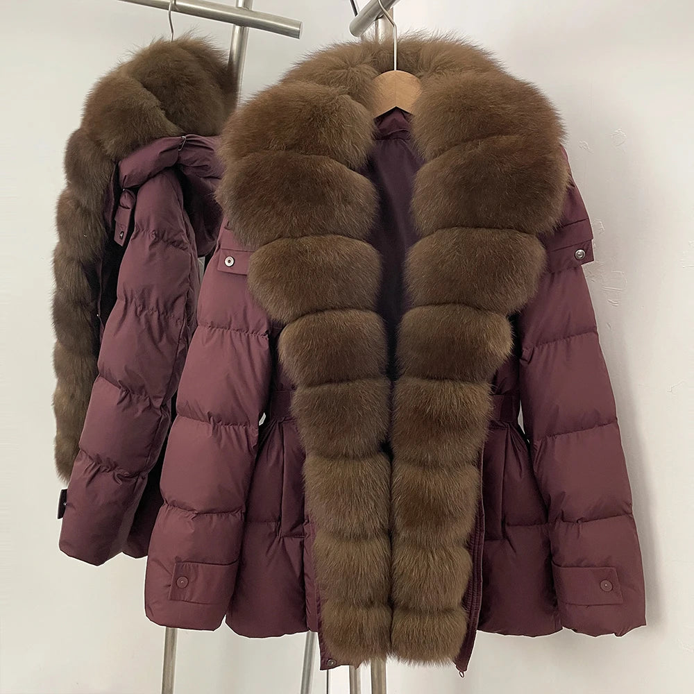 Purple puffer jacket with brown fur hood and collar