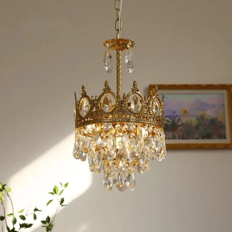 A luxurious living room adorned with a French crystal chandelier, creating a warm and inviting atmosphere. A