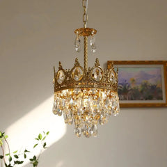 A luxurious living room adorned with a French crystal chandelier, creating a warm and inviting atmosphere. A