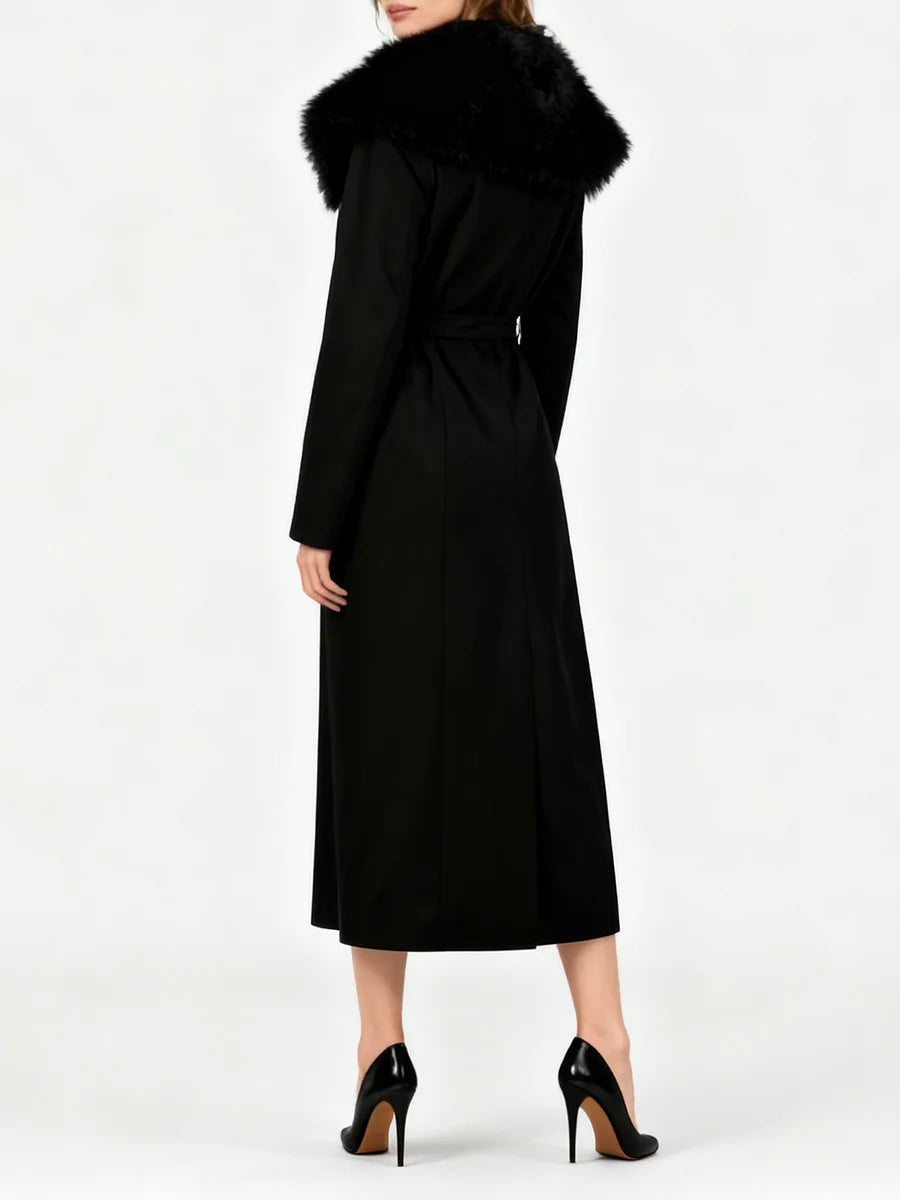 Black coat with fur collar on a white background