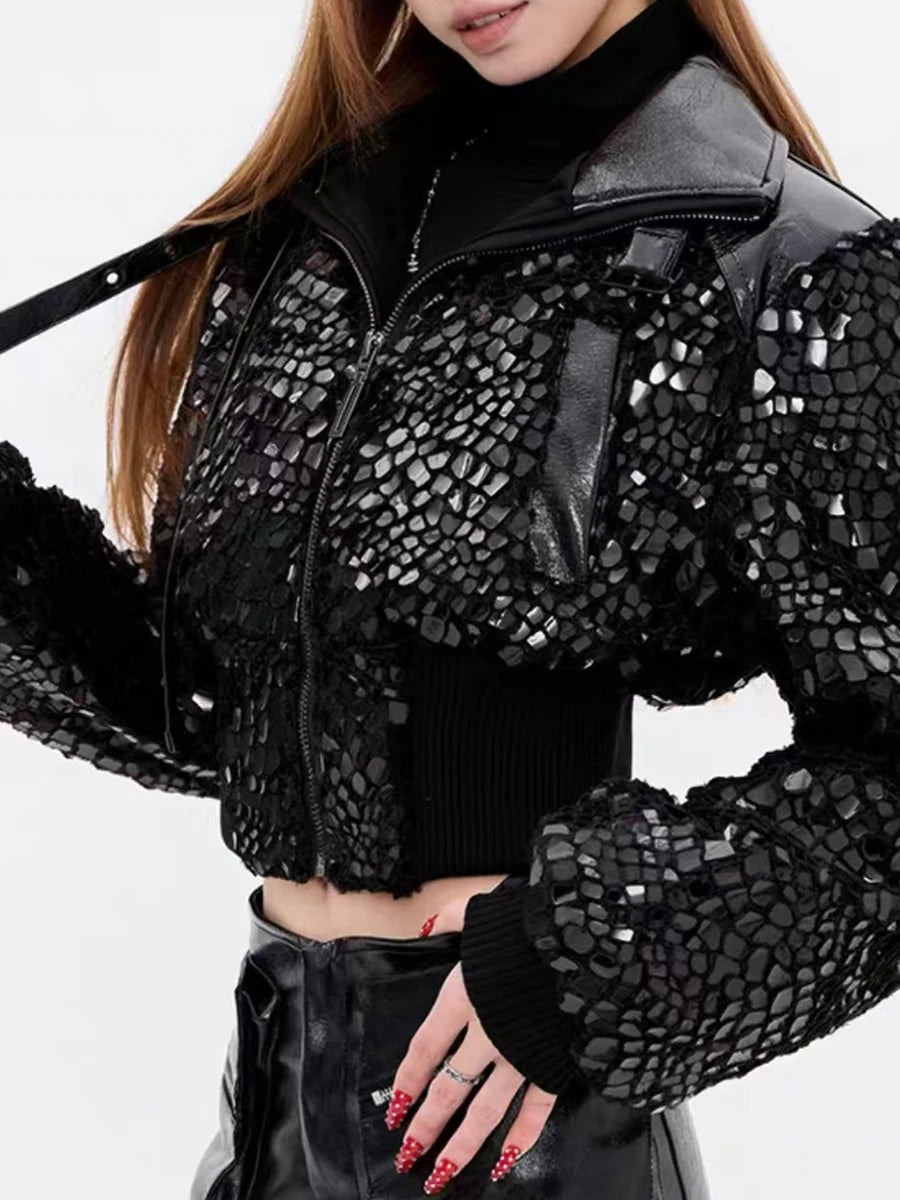 Person wearing a black sequin jacket 