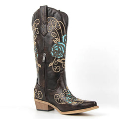 Brown cowboy boot with floral embroidery on a white background