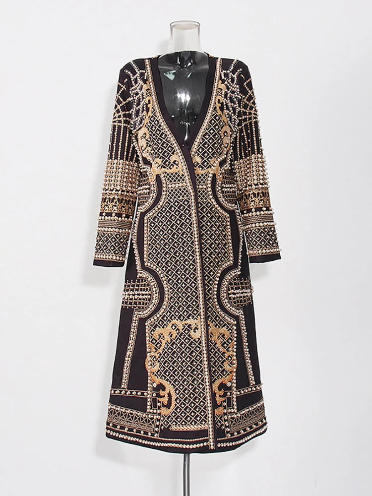 Embellished geometric print coat on mannequin front