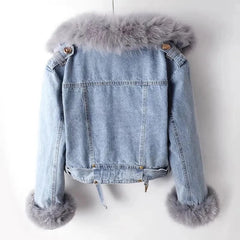 Close-up of the thick, plush fur collar on a denim jacket, highlighting the luxurious texture and warmth. Back View 2