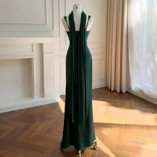 Back view of a square neck maxi dress with a flowing sash
