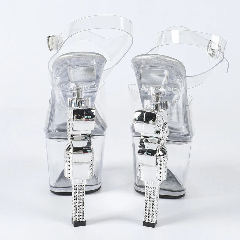 Clear high-heeled sandals with rhinestone embellishments on a white background