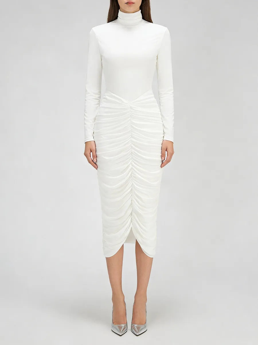 White ruched dress worn by a model on a plain background