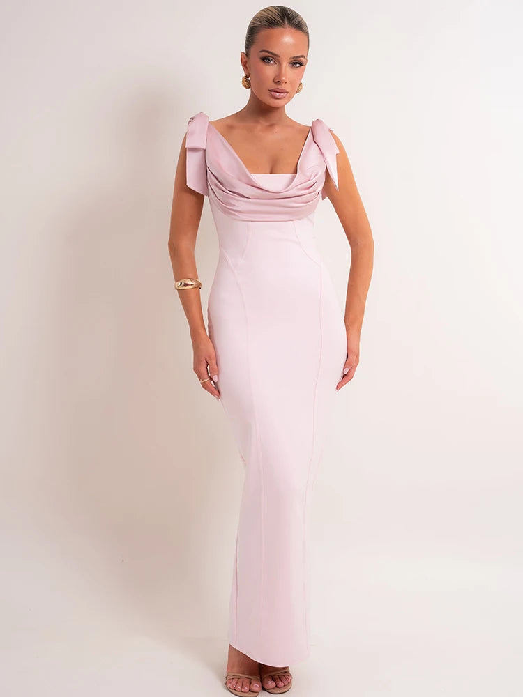 Close-up of pink draped cowl bow shoulder maxi dress neckline