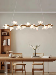 Modern dining room with a decorative ceiling light fixture.
