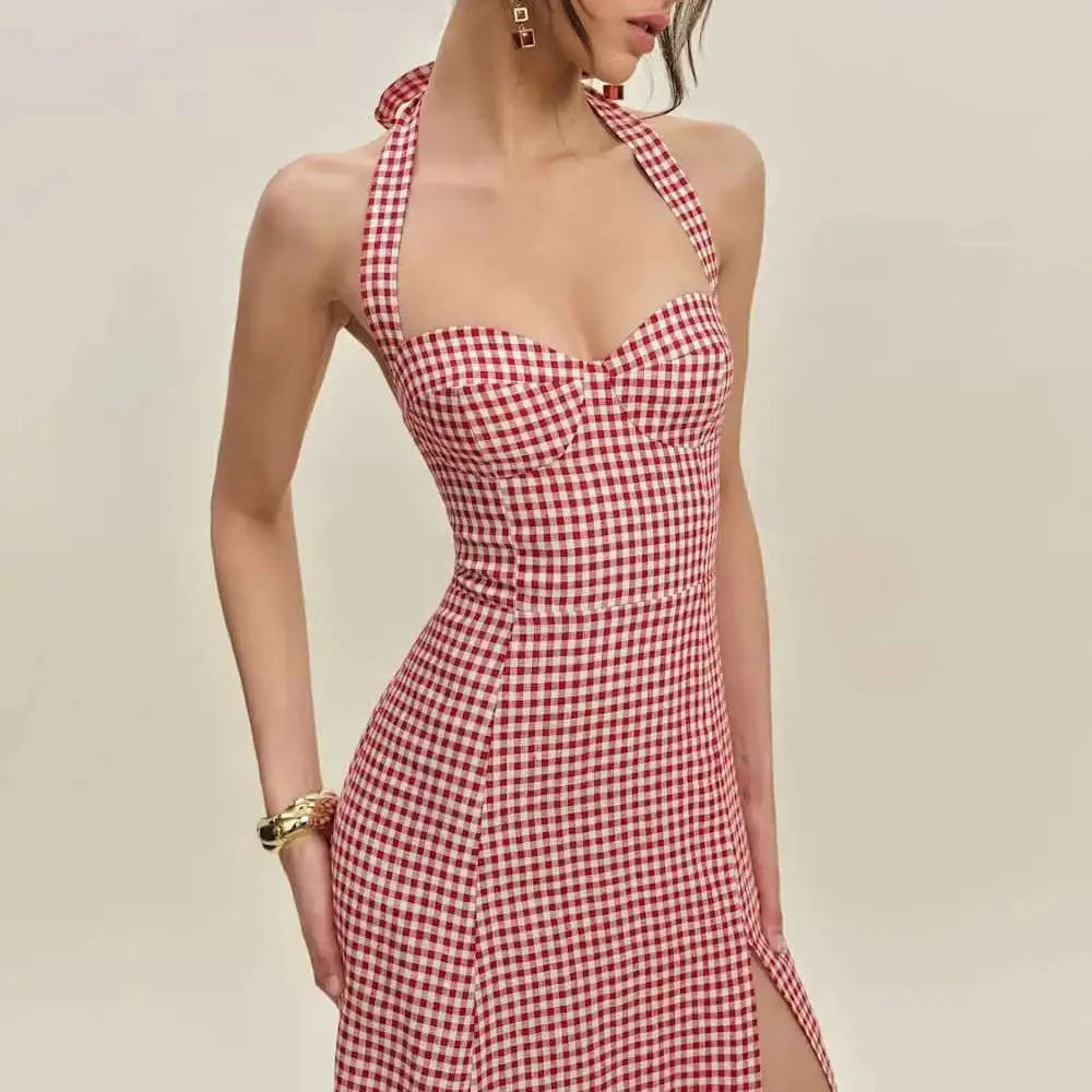 Red and white checkered dress worn by a model on a plain background