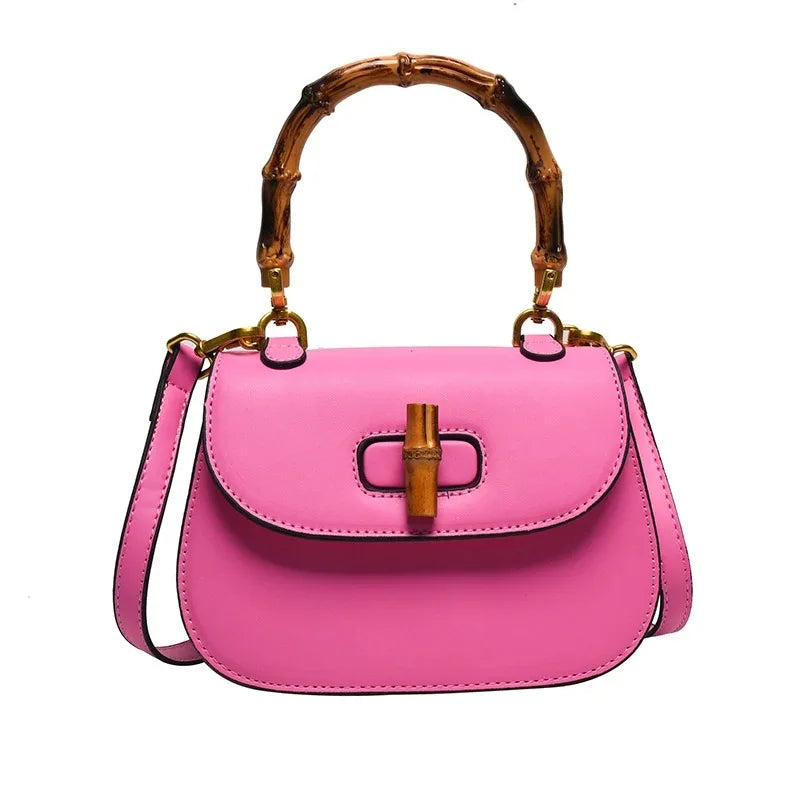 Pink bamboo handle saddle bag
