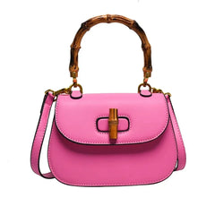 Pink bamboo handle saddle bag