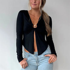 Black long sleeve crop top with front ring detail and asymmetric hem