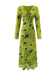 V-neck tie-front long sleeve midi dress with diamond pattern, front view.