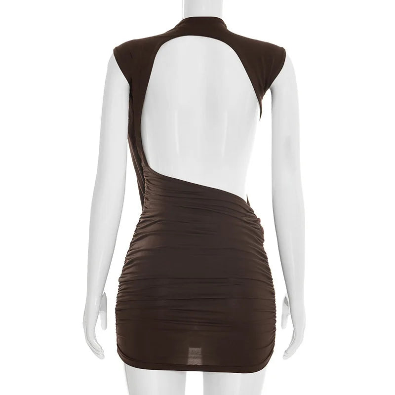 Brown dress with open back on a mannequin against a white background