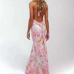 Woman wearing a floral dress with a white background