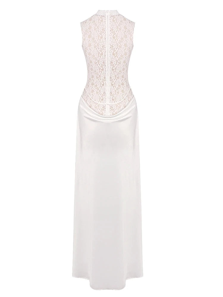 White dress with lace detailing on a white background