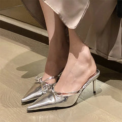 Butterfly-knot pointed toe low heels sandals for women.