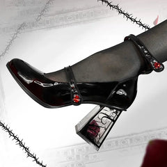Foot wearing patent leather Mary Jane heels showing heel detail