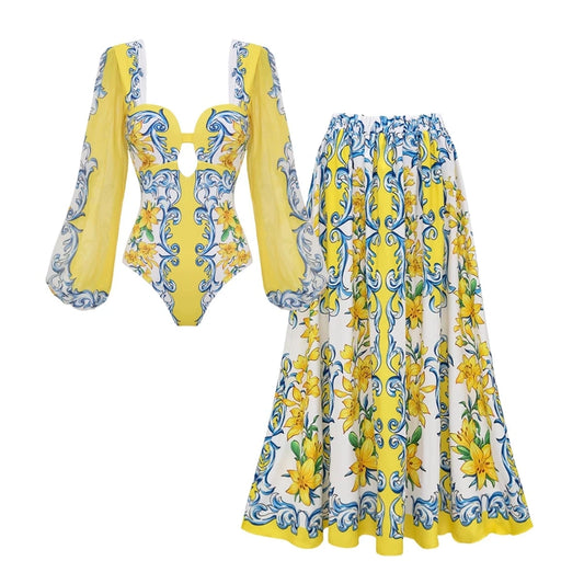 Balloon sleeve square neck cutout bodysuit and print maxi skirt set laid flat.