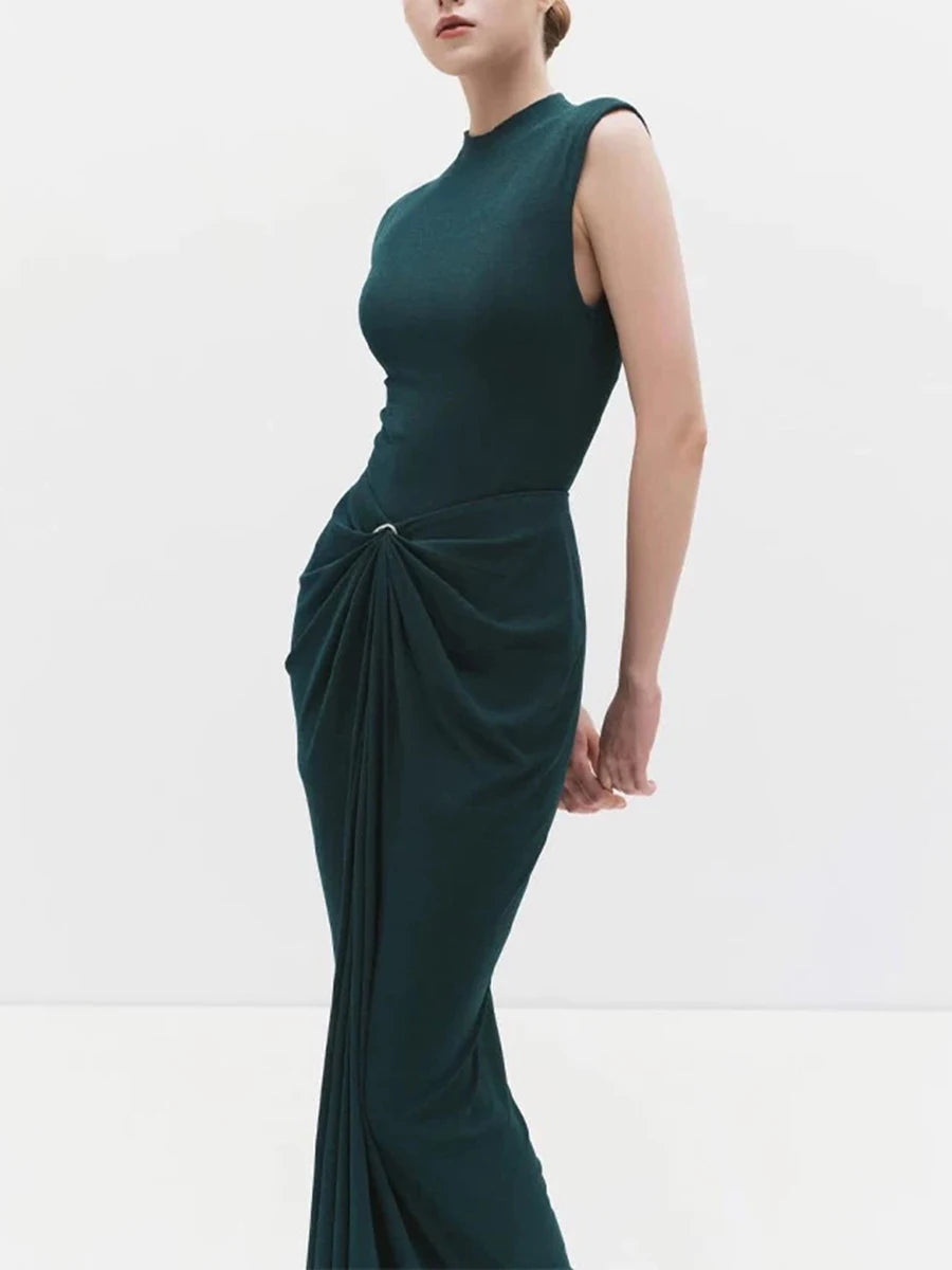 Side view of sleeveless mock neck draped maxi dress