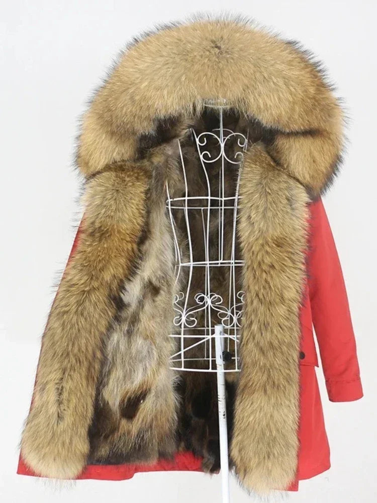 Red coat with fur hood on a mannequin against a white background