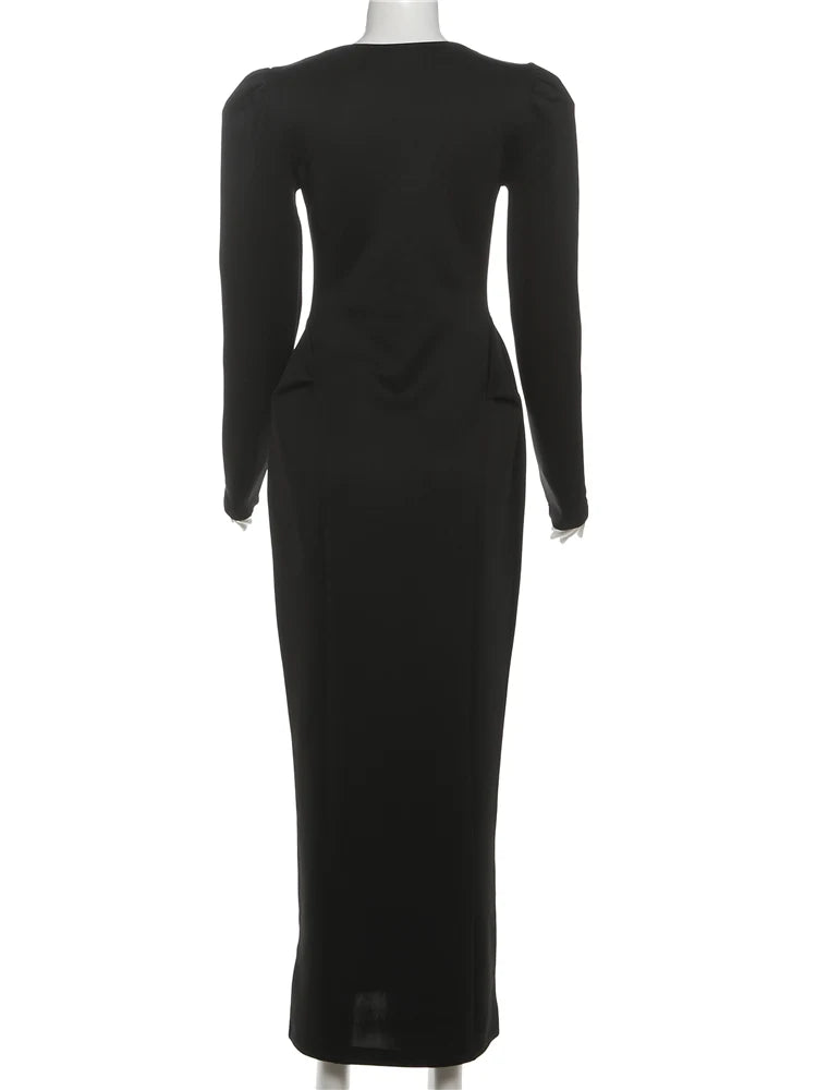 Black dress on a mannequin against a white background