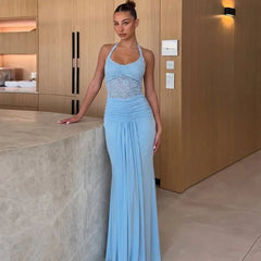 Close-up of the lace detail on a halter neck maxi dress