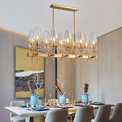  Modern gold LED chandelier with a luxurious design and sparkling glass accents, illuminating a stylish Dining Room. Golden Atelier 4