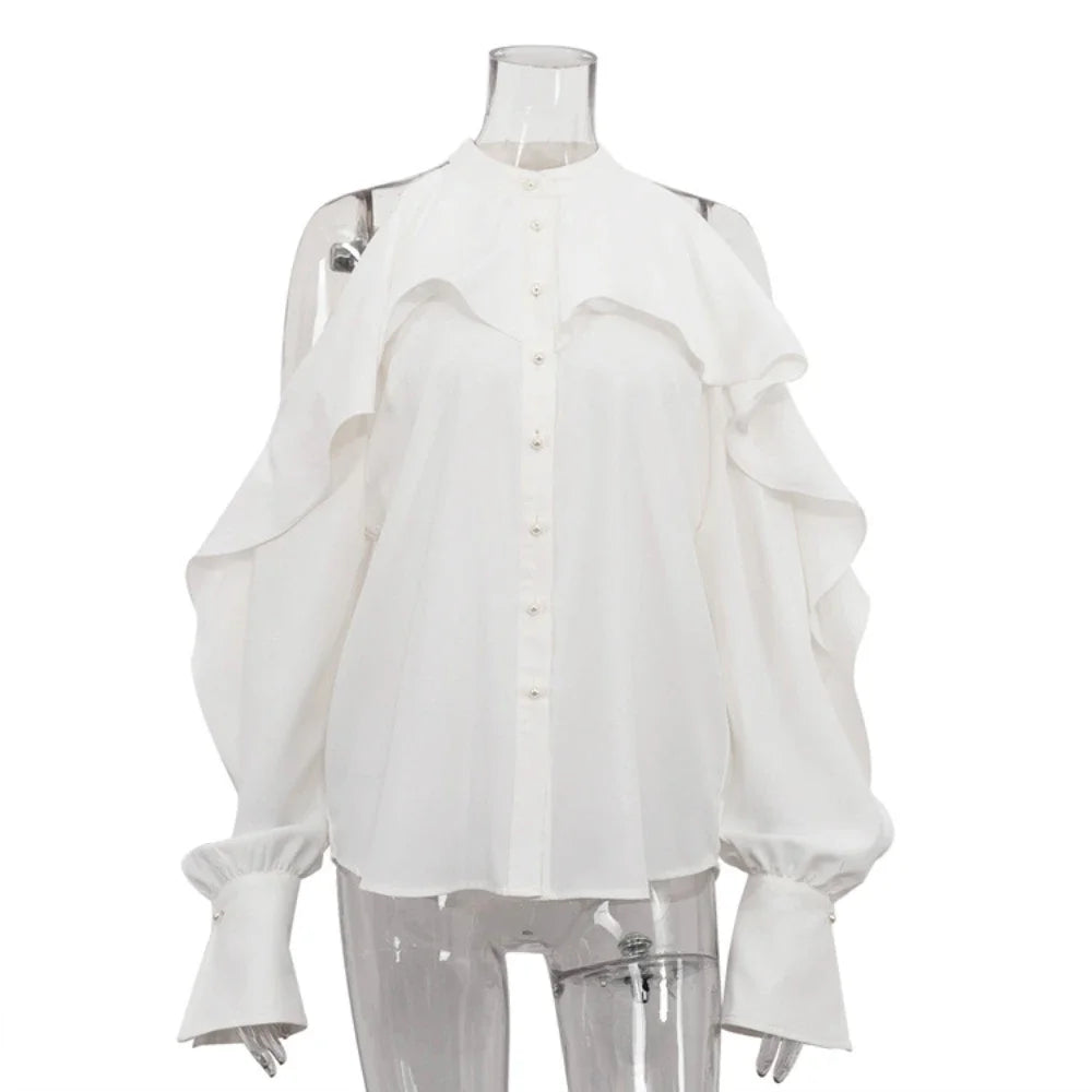 White blouse with ruffled sleeves on a mannequin against a white background