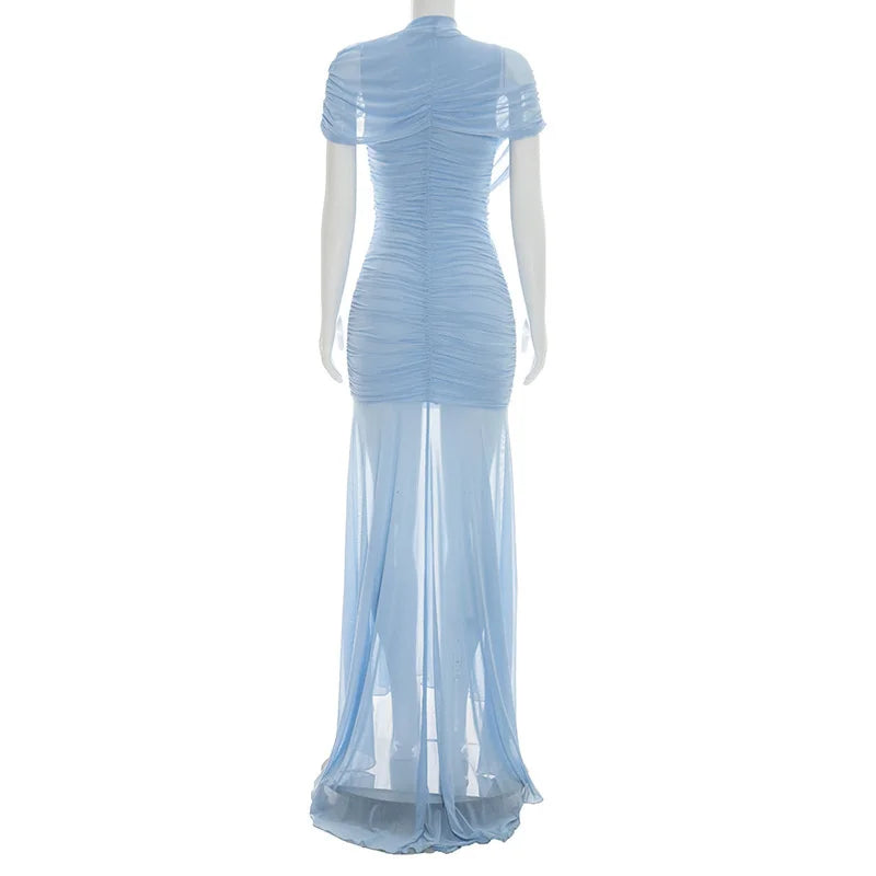 Mannequin wearing a light blue dress with sheer overlay on a white background