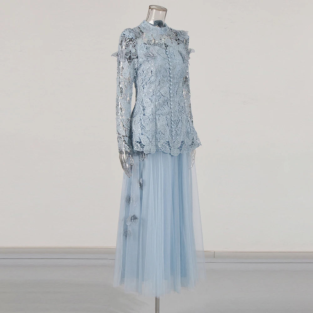 Light blue lace dress on a mannequin against a white background