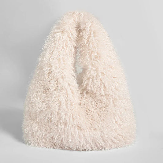 Cream faux fur textured shoulder bag.